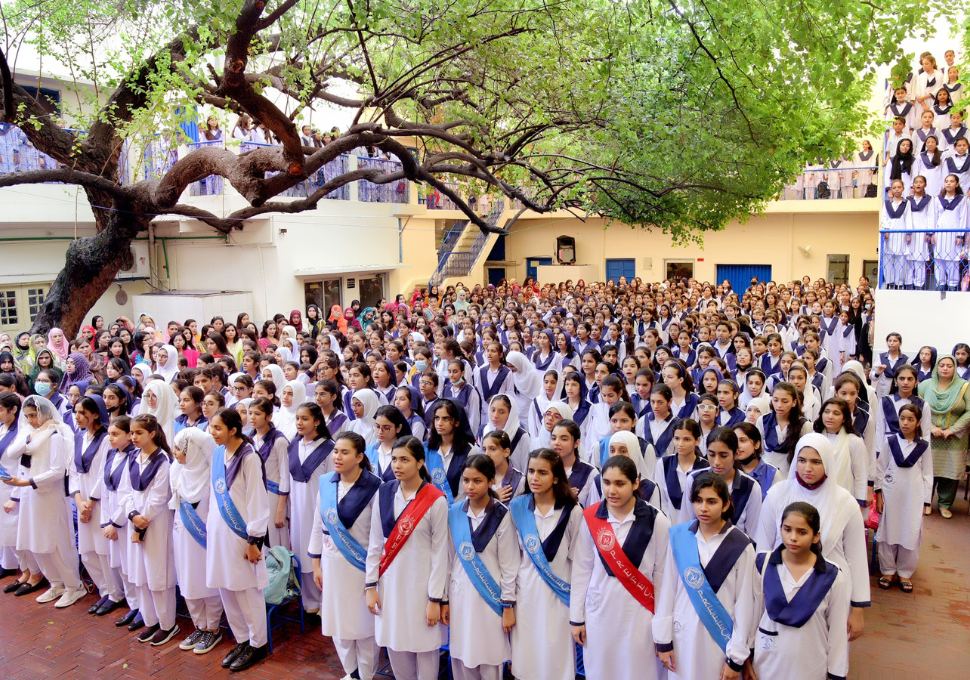 Students gathered in a school courtyard
