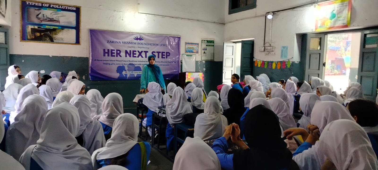 A full classroom of girls at a Her Next Step session