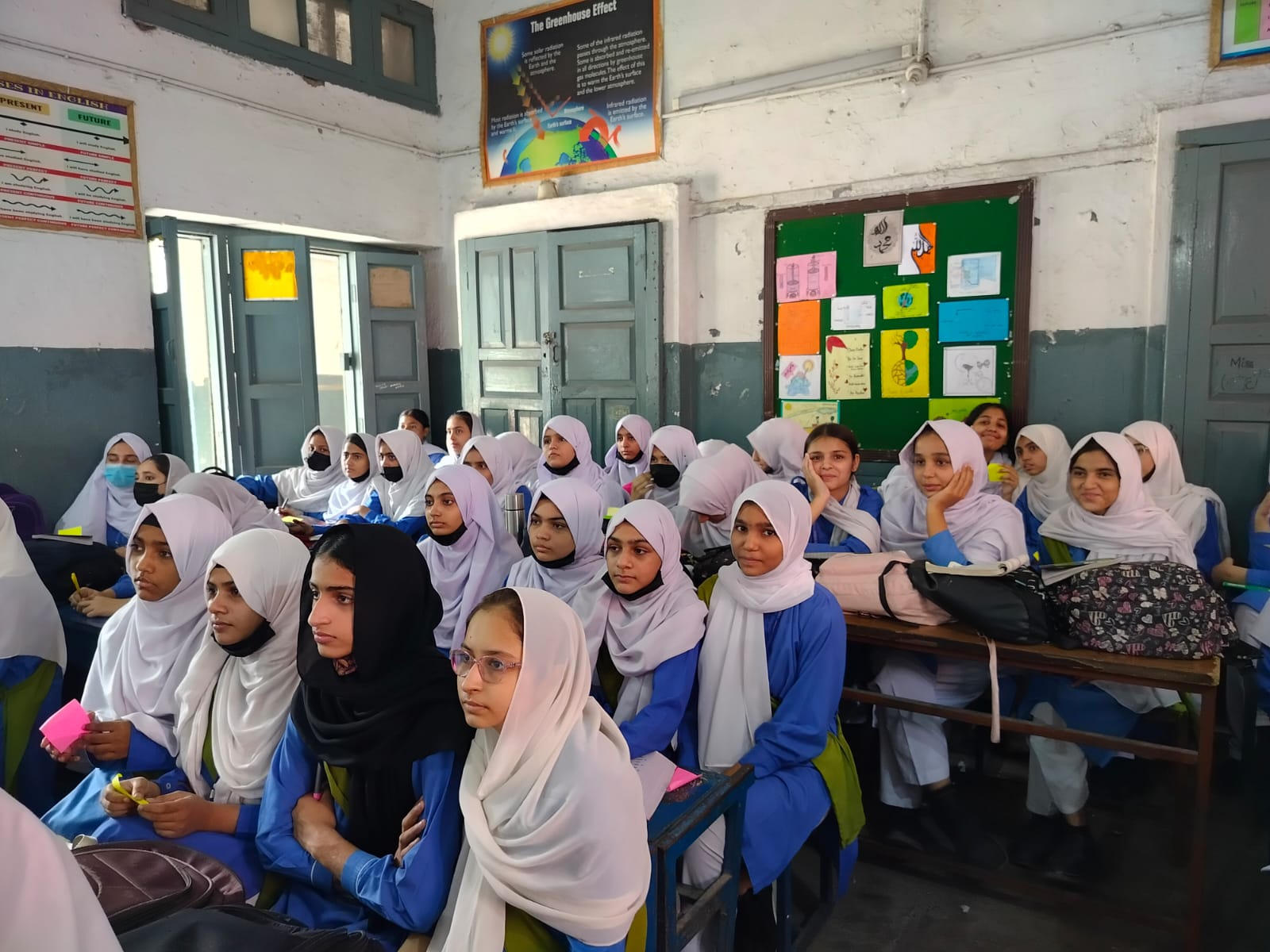 Government school students listening during a session